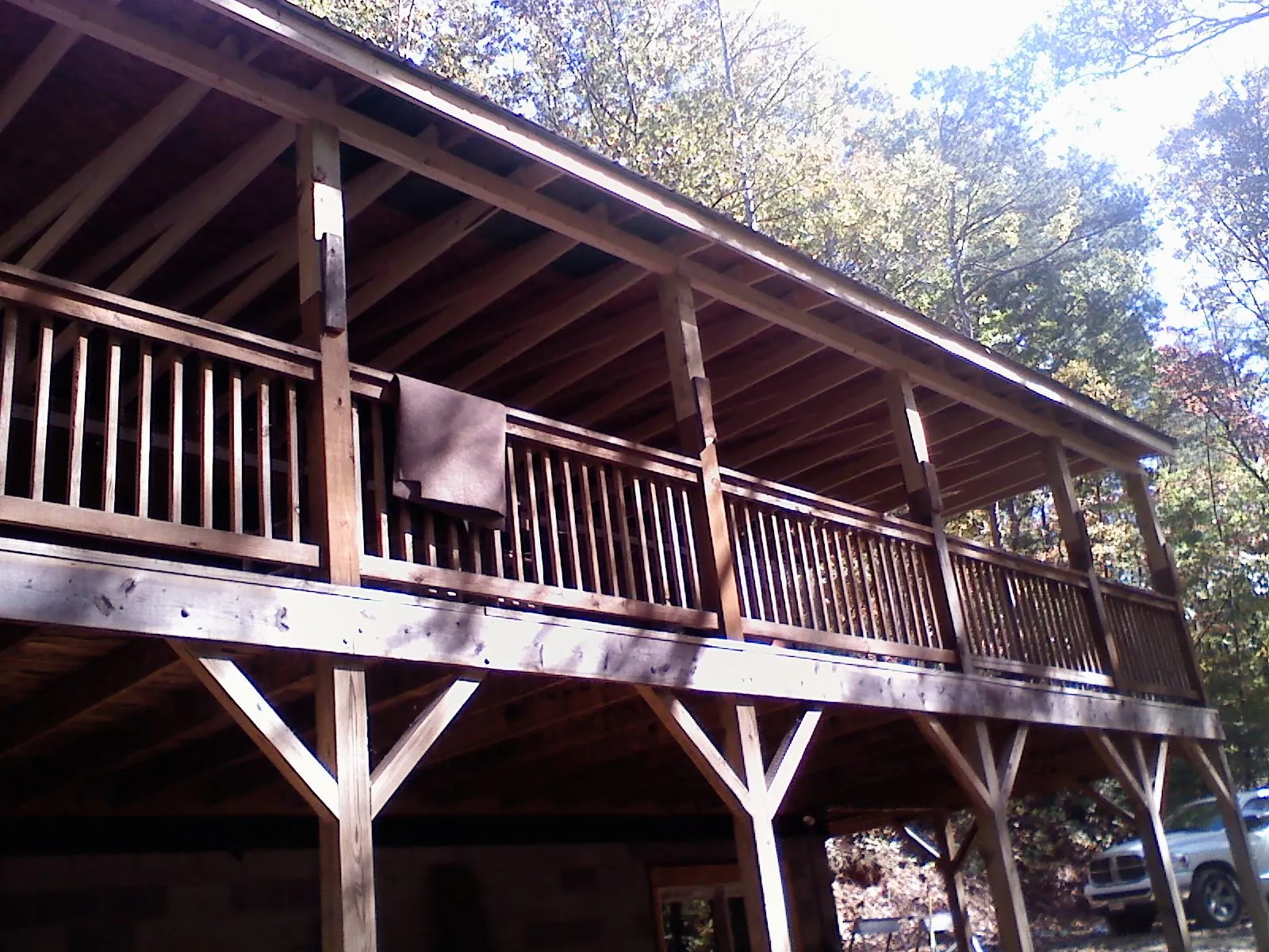 Timber framing under a new elevated porch and deck — Roof Leak Repair in Crescent City by Roofing Brothers
